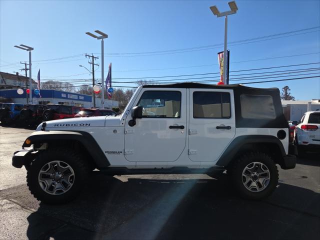 used 2014 Jeep Wrangler Unlimited car, priced at $24,884