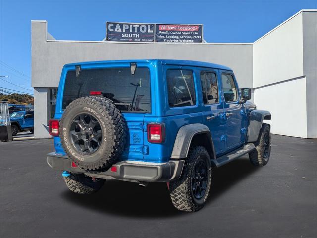 used 2023 Jeep Wrangler 4xe car, priced at $32,869