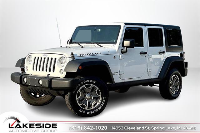 used 2014 Jeep Wrangler Unlimited car, priced at $21,888