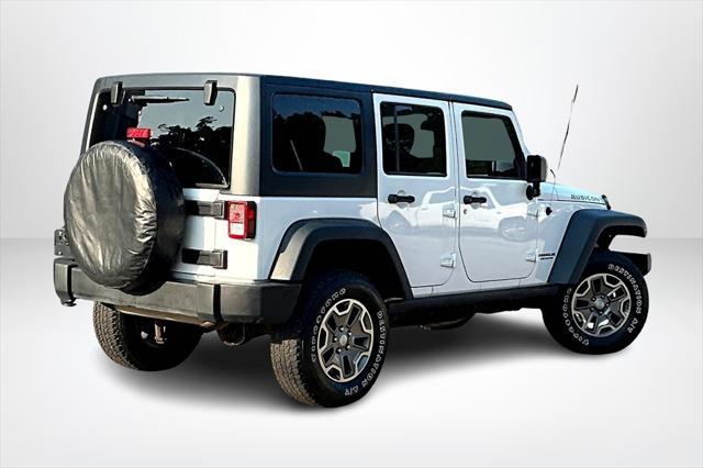 used 2014 Jeep Wrangler Unlimited car, priced at $21,888