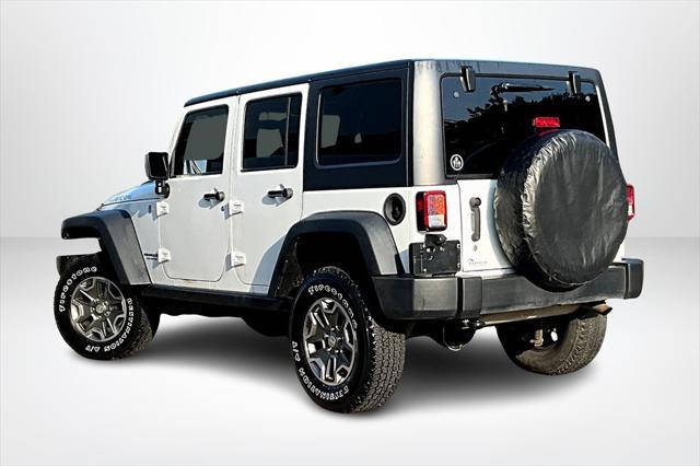 used 2014 Jeep Wrangler Unlimited car, priced at $21,888