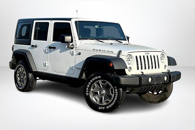 used 2014 Jeep Wrangler Unlimited car, priced at $21,888