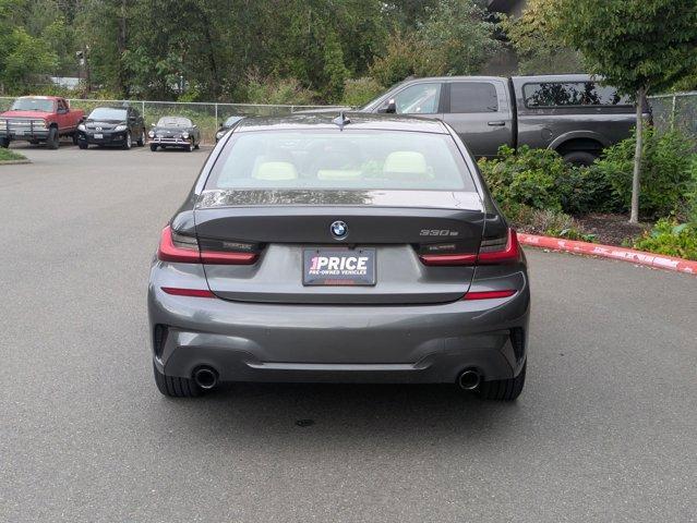 used 2022 BMW 330e car, priced at $31,880