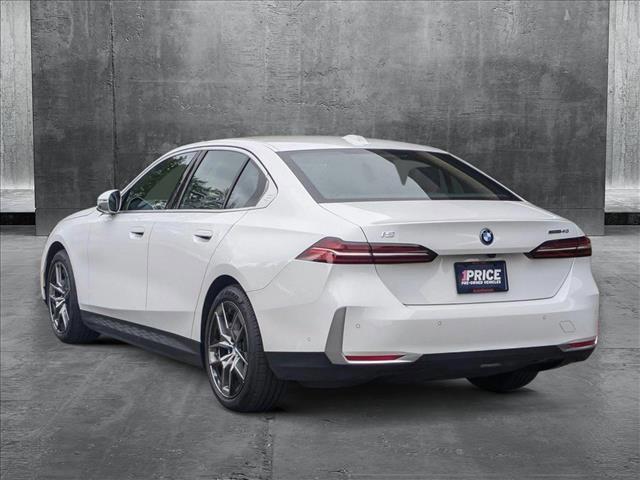 used 2024 BMW i5 car, priced at $53,980