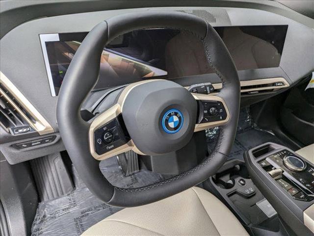 used 2025 BMW iX car, priced at $92,620