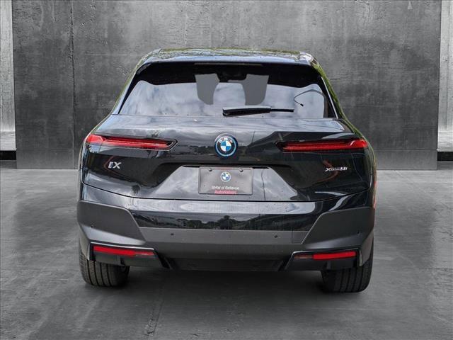 used 2025 BMW iX car, priced at $92,620