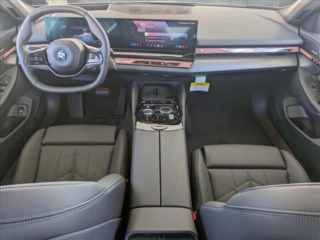 used 2024 BMW i5 car, priced at $63,595