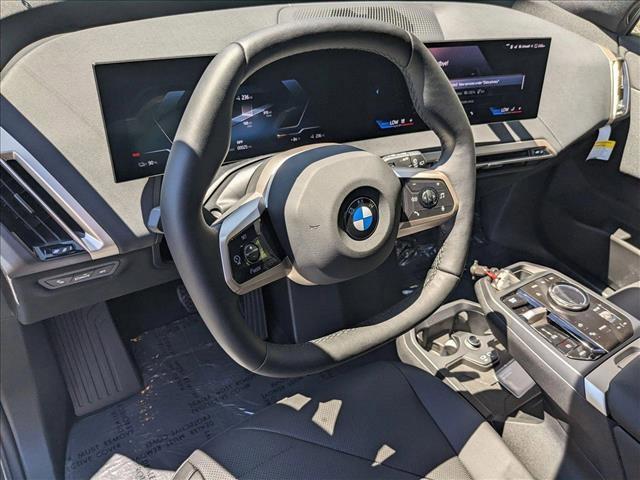 new 2026 BMW iX car, priced at $82,695