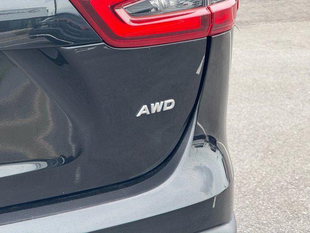 used 2021 Nissan Rogue Sport car, priced at $15,987