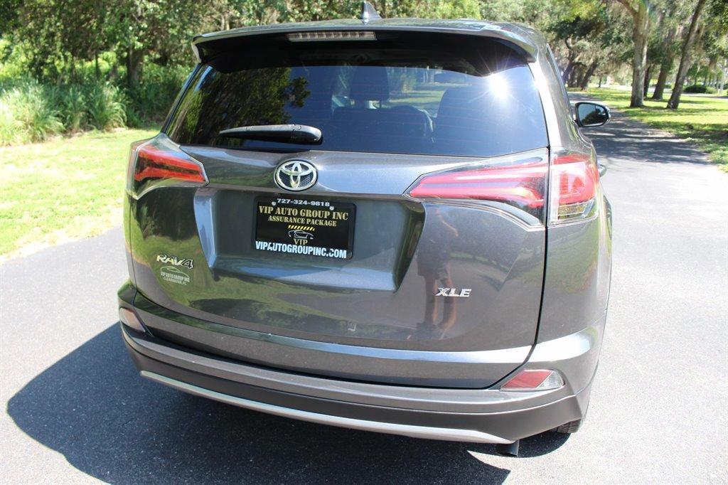 used 2018 Toyota RAV4 car, priced at $14,995