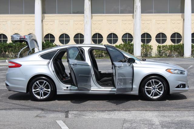 used 2016 Ford Fusion Energi car, priced at $5,995