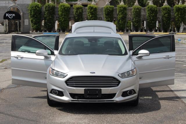 used 2016 Ford Fusion Energi car, priced at $5,995