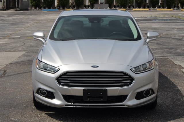 used 2016 Ford Fusion Energi car, priced at $5,995