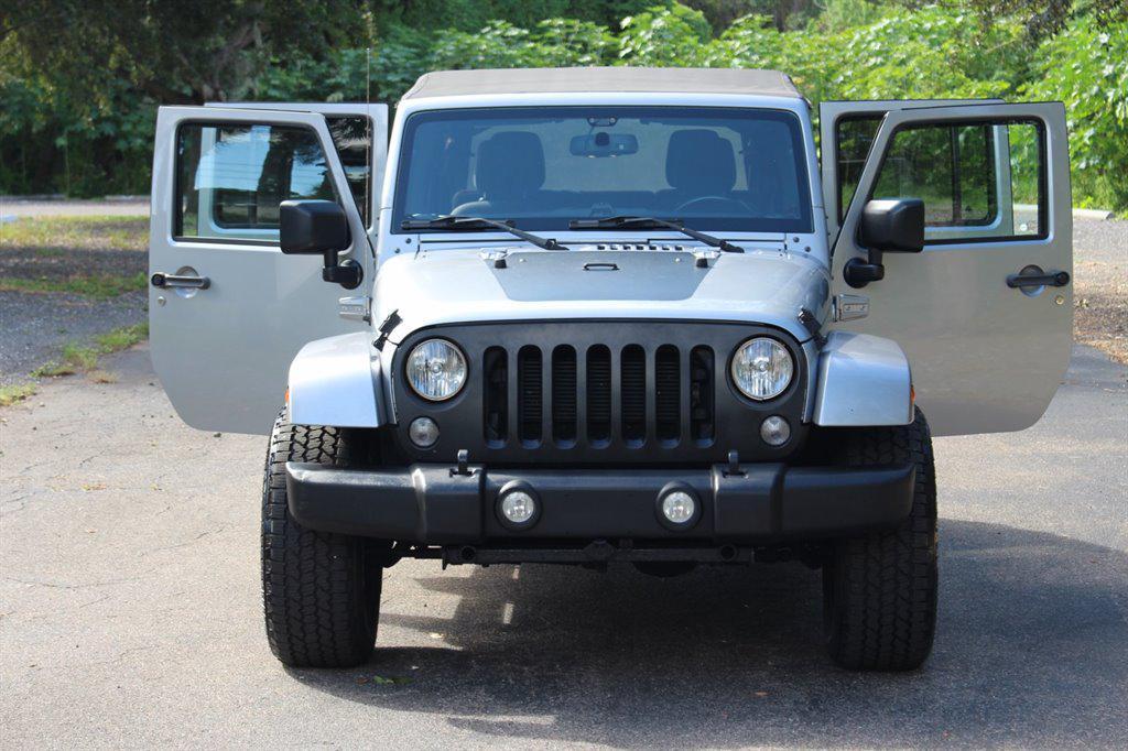 used 2015 Jeep Wrangler Unlimited car, priced at $17,995