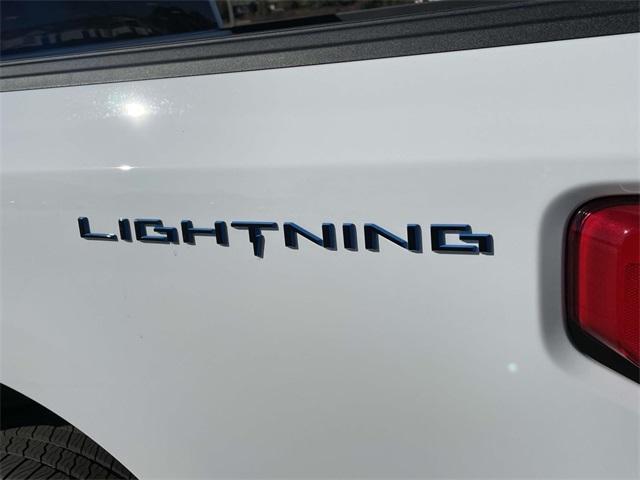 new 2023 Ford F-150 Lightning car, priced at $58,995