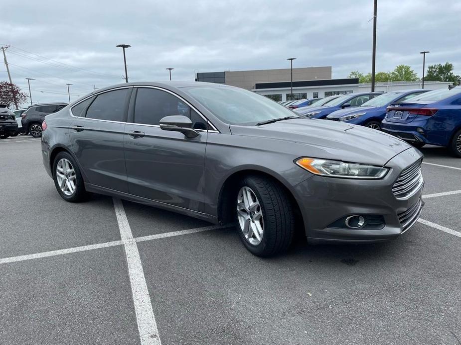 used 2014 Ford Fusion car, priced at $6,989