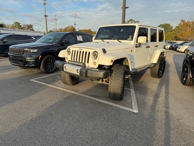 used 2015 Jeep Wrangler Unlimited car, priced at $16,865