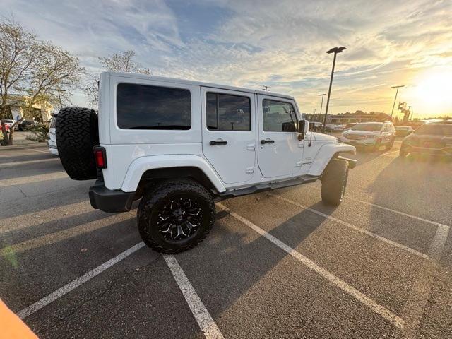 used 2015 Jeep Wrangler Unlimited car, priced at $16,865