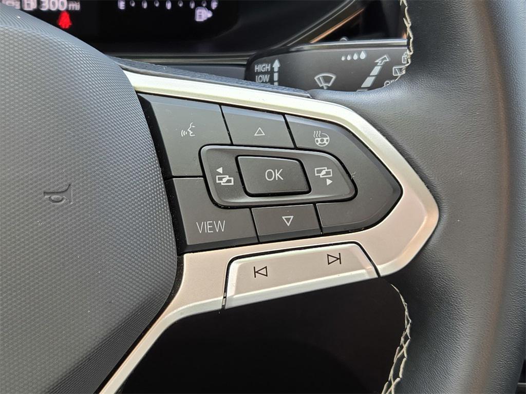 used 2024 Volkswagen Taos car, priced at $20,344