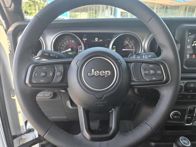 used 2023 Jeep Wrangler 4xe car, priced at $28,911