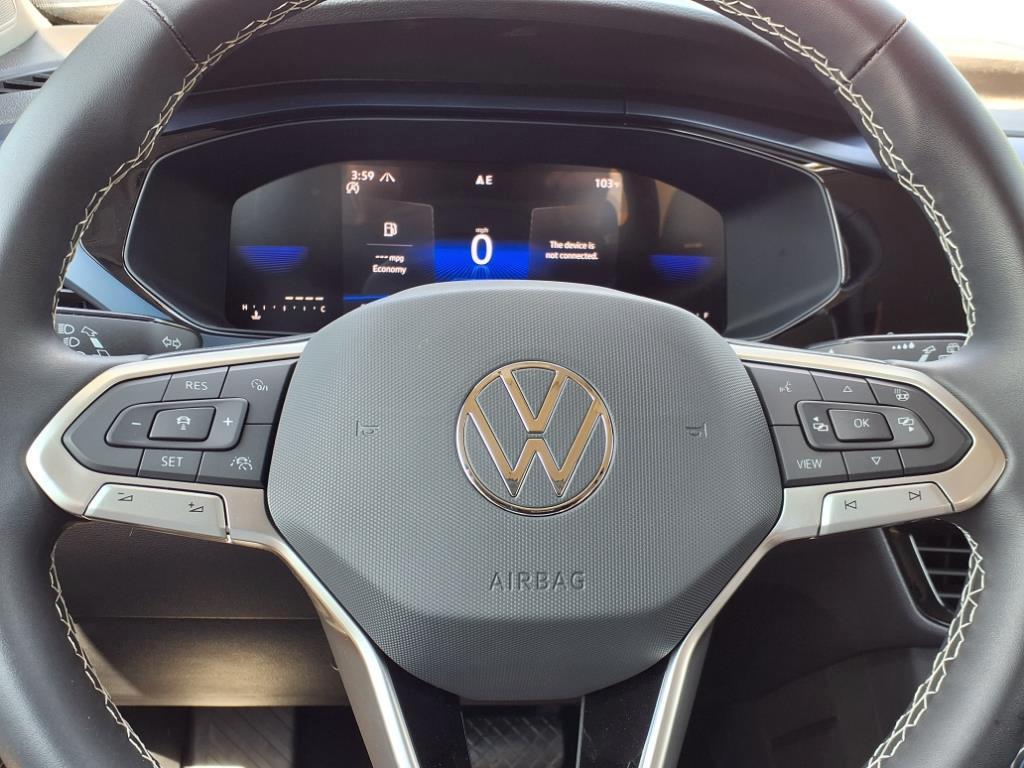 used 2023 Volkswagen Taos car, priced at $25,583