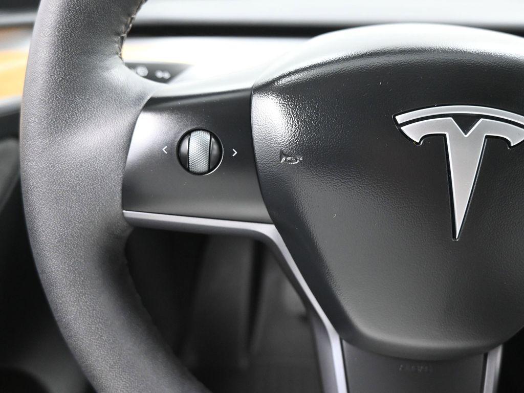 used 2023 Tesla Model Y car, priced at $30,895