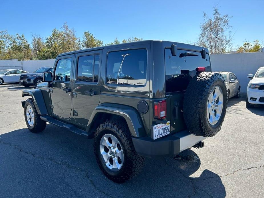 used 2015 Jeep Wrangler Unlimited car, priced at $21,495