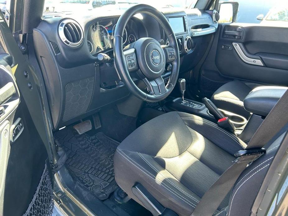 used 2015 Jeep Wrangler Unlimited car, priced at $21,495