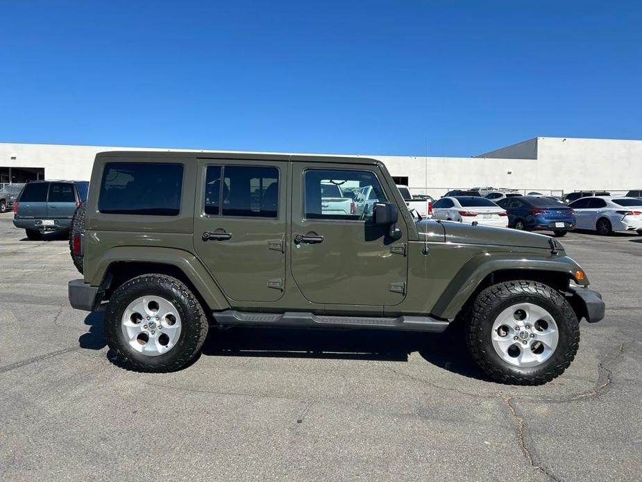 used 2015 Jeep Wrangler Unlimited car, priced at $21,495