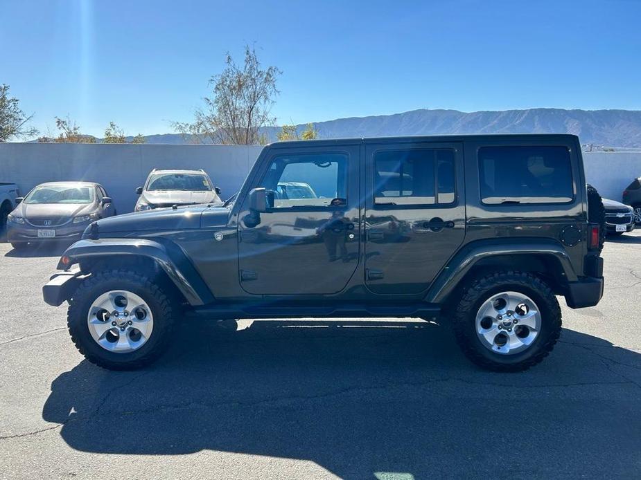 used 2015 Jeep Wrangler Unlimited car, priced at $21,495