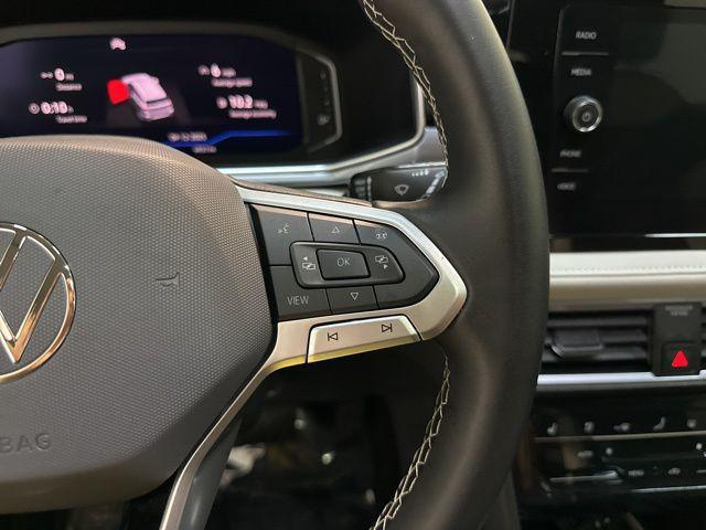 used 2025 Volkswagen Taos car, priced at $31,330