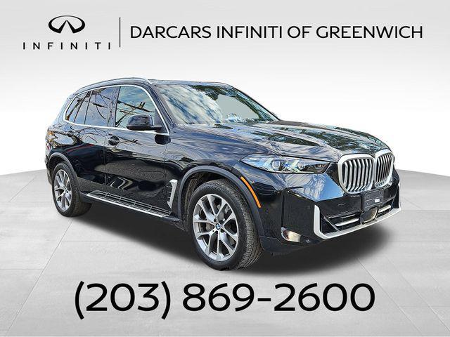 used 2024 BMW X5 car, priced at $55,000