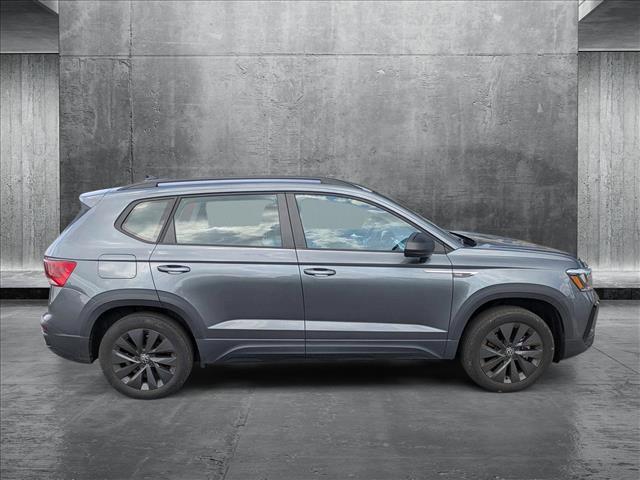 used 2023 Volkswagen Taos car, priced at $14,489