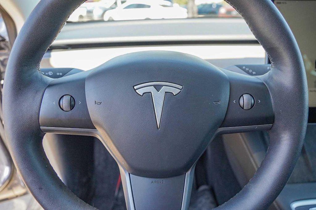 used 2023 Tesla Model 3 car, priced at $25,598