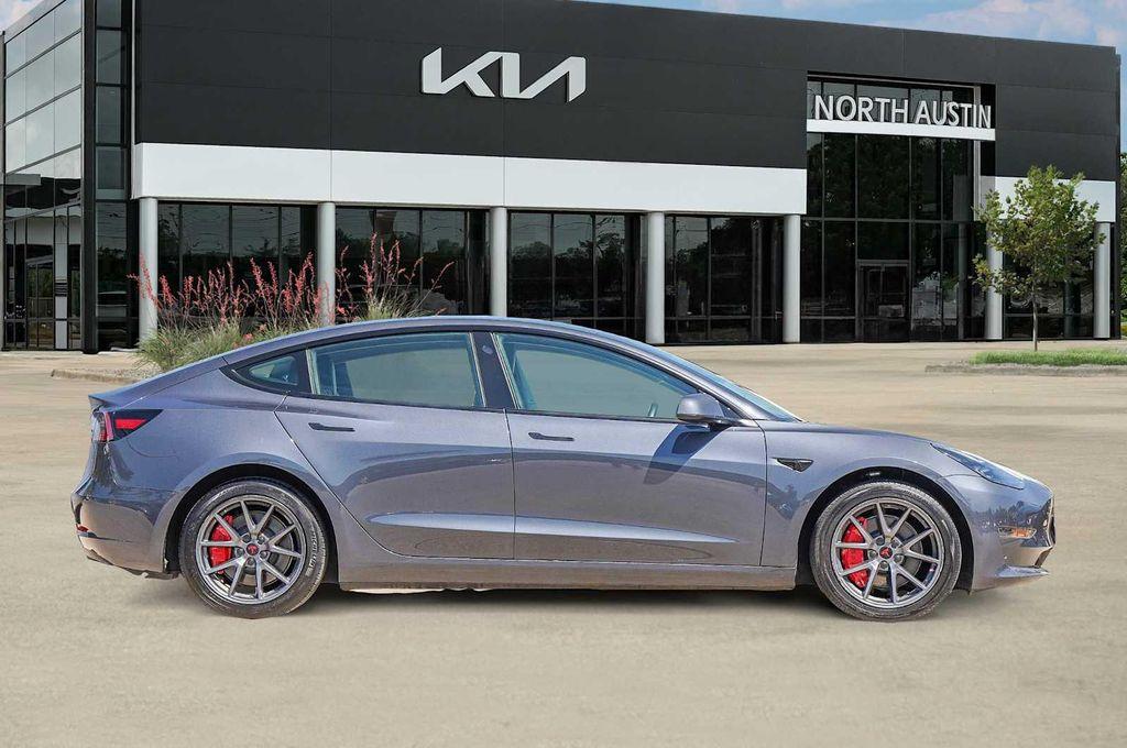used 2023 Tesla Model 3 car, priced at $25,598