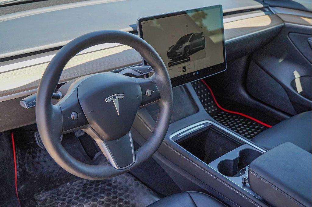 used 2023 Tesla Model 3 car, priced at $25,598