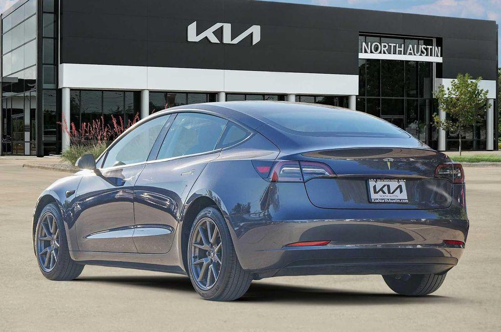 used 2023 Tesla Model 3 car, priced at $27,998
