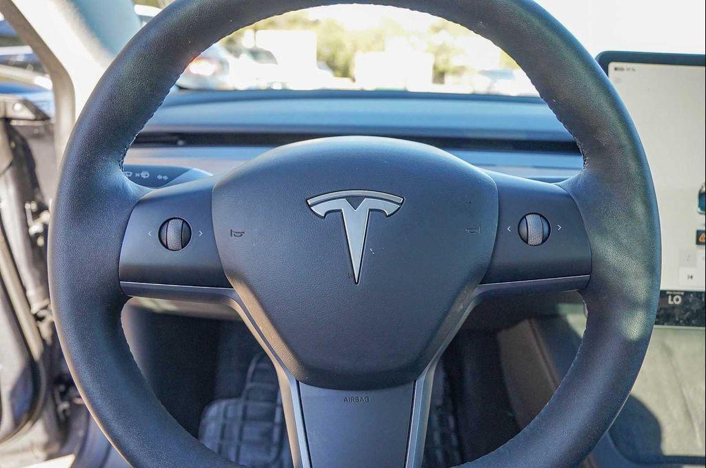 used 2023 Tesla Model 3 car, priced at $27,998