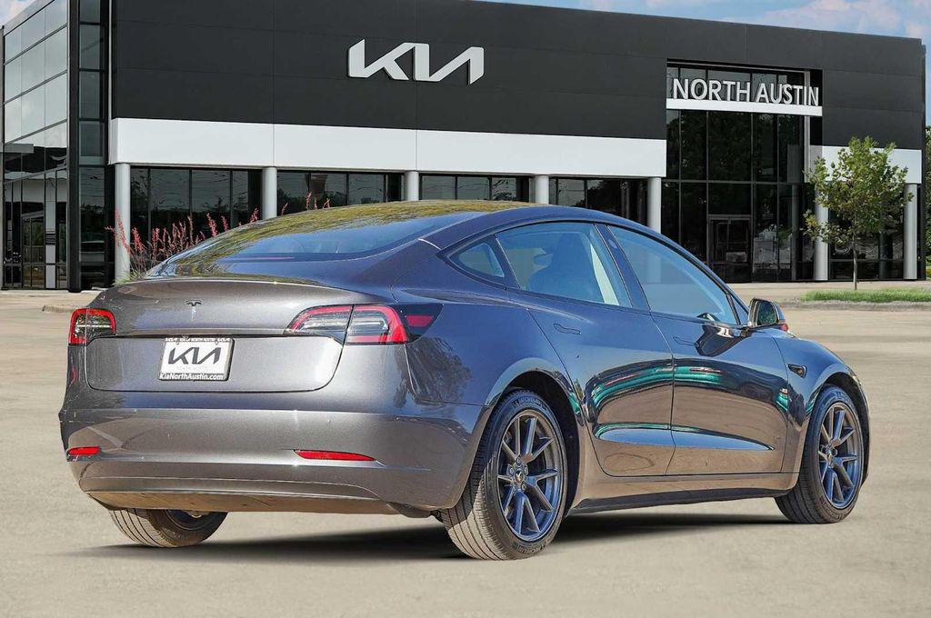 used 2023 Tesla Model 3 car, priced at $27,998