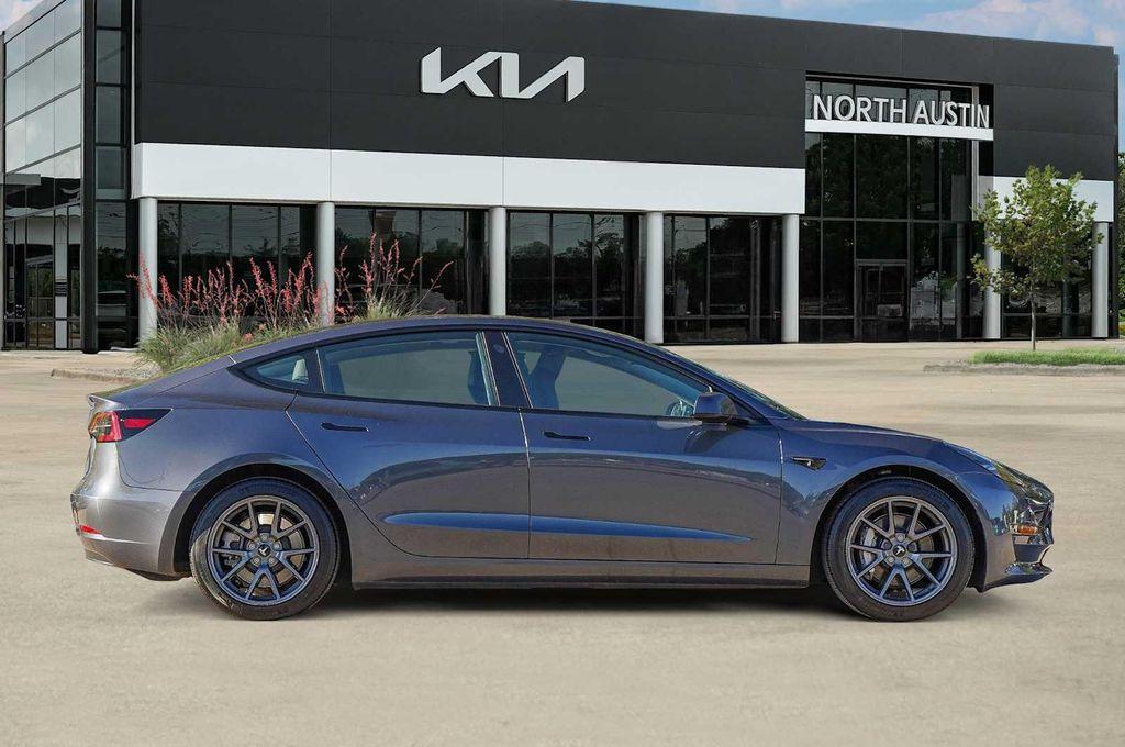 used 2023 Tesla Model 3 car, priced at $27,998