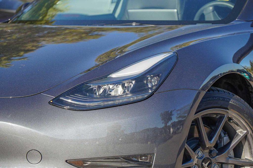 used 2023 Tesla Model 3 car, priced at $27,998
