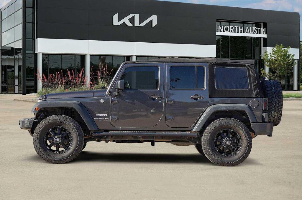 used 2014 Jeep Wrangler Unlimited car, priced at $15,998