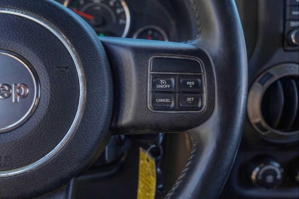 used 2014 Jeep Wrangler Unlimited car, priced at $15,998