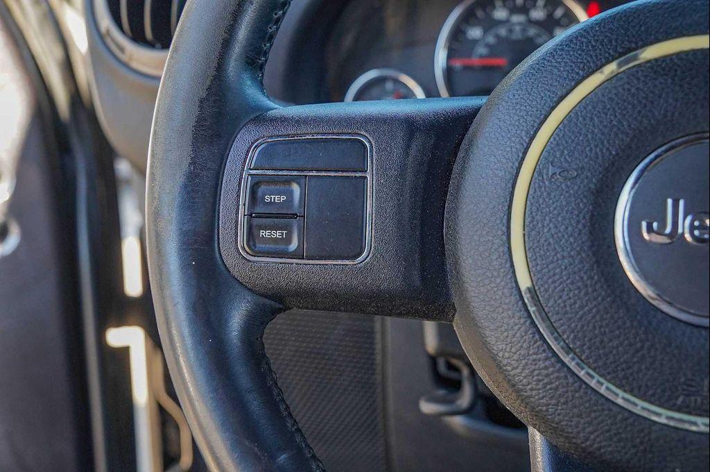 used 2014 Jeep Wrangler Unlimited car, priced at $15,998