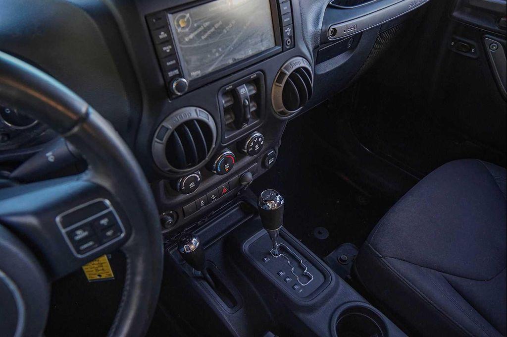 used 2014 Jeep Wrangler Unlimited car, priced at $15,998