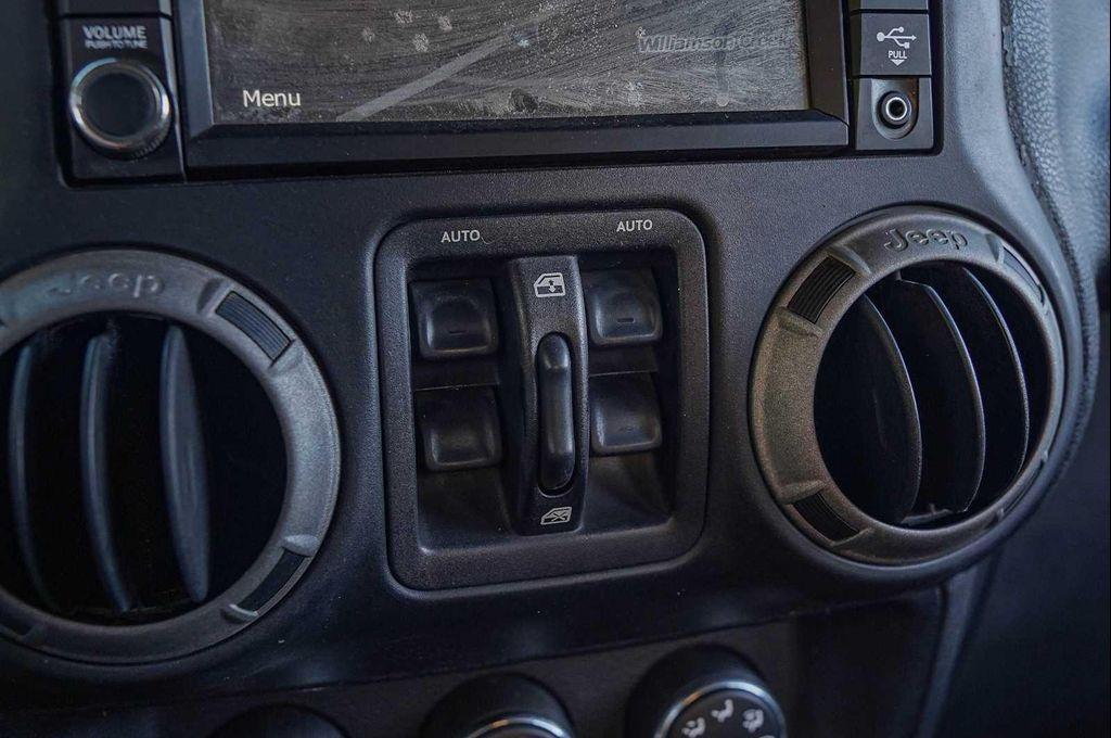 used 2014 Jeep Wrangler Unlimited car, priced at $15,998