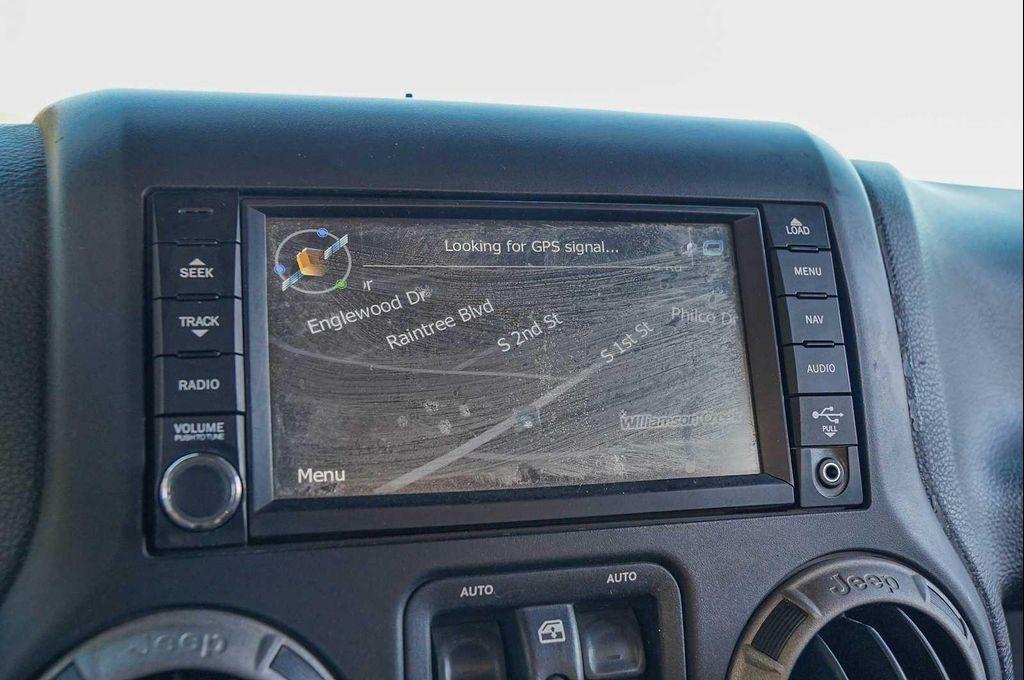 used 2014 Jeep Wrangler Unlimited car, priced at $15,998