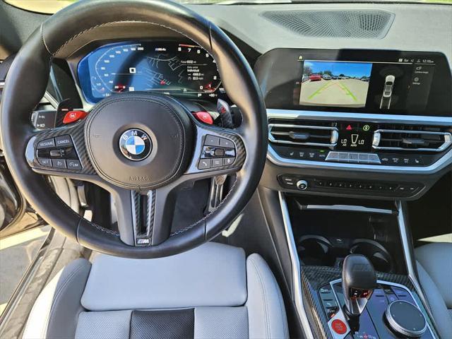 used 2022 BMW M4 car, priced at $77,500