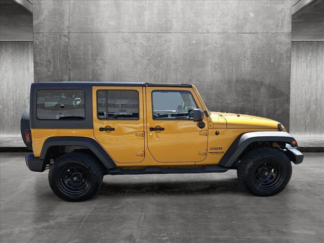 used 2014 Jeep Wrangler Unlimited car, priced at $19,455