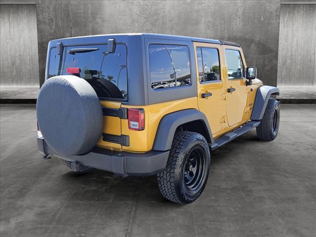 used 2014 Jeep Wrangler Unlimited car, priced at $19,455